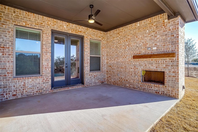 view of patio with ceiling fan and french doors