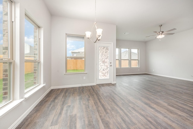 213 Giddings Trl, Forney, TX 75126 - unfurnished dining area with dark wood finished floors, a chandelier, and a ceiling fan