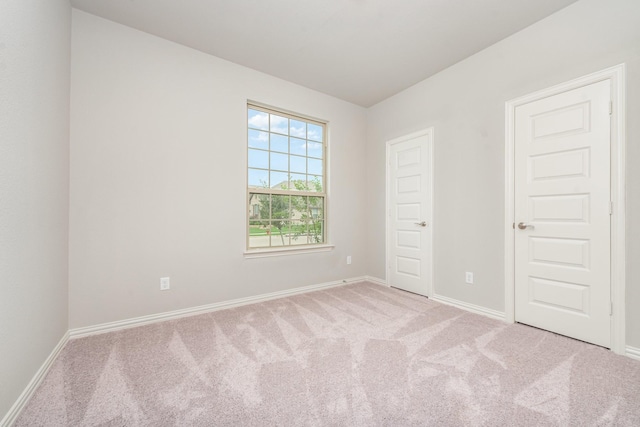 empty room with light carpet