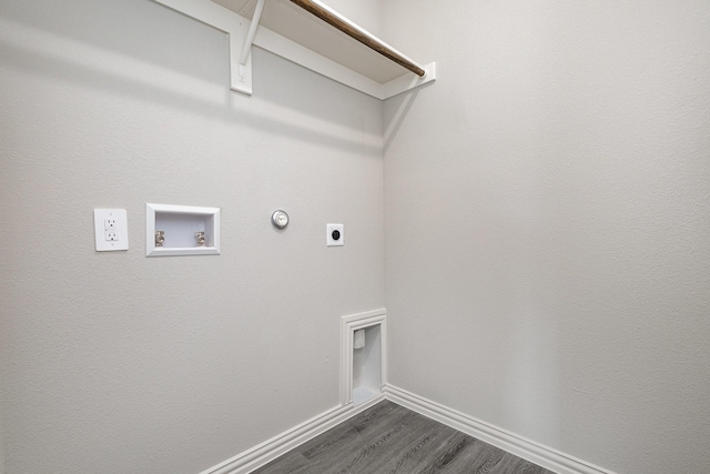 laundry area featuring washer hookup, electric dryer hookup, dark hardwood / wood-style flooring, and hookup for a gas dryer