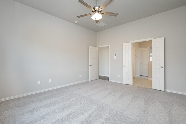 unfurnished bedroom with light carpet and ceiling fan