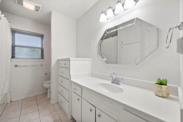 bathroom with tile patterned floors, toilet, a textured ceiling, vanity, and a shower with shower curtain