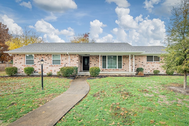 ranch-style house with a front yard