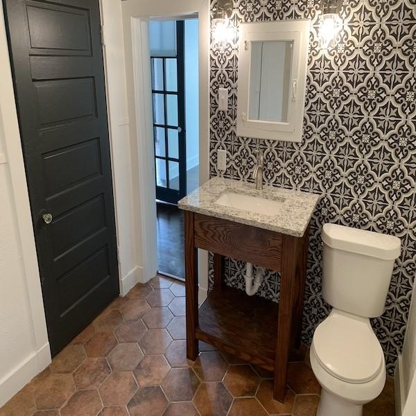 bathroom featuring sink and toilet