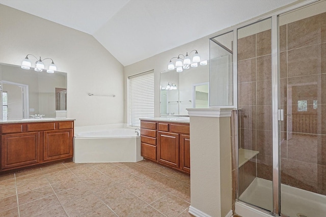 bathroom with vanity, independent shower and bath, and vaulted ceiling