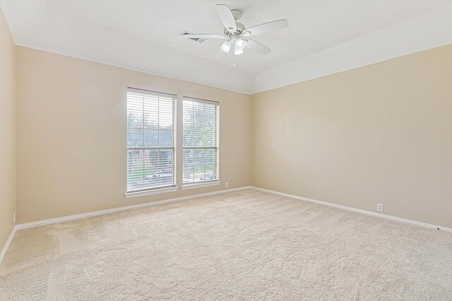 empty room featuring carpet flooring and ceiling fan