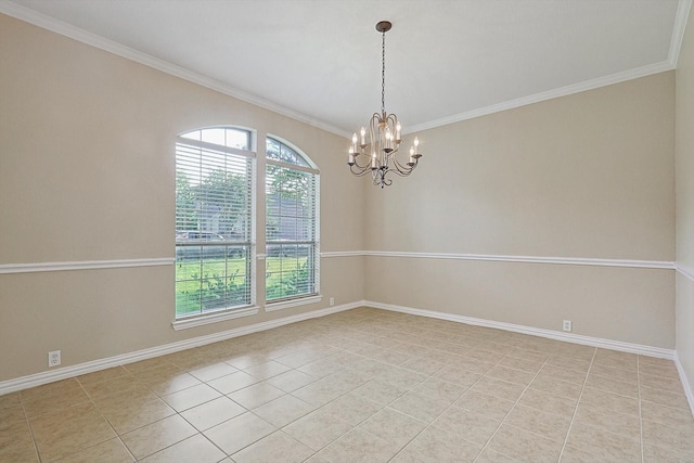 tiled spare room featuring a chandelier, plenty of natural light, and crown molding