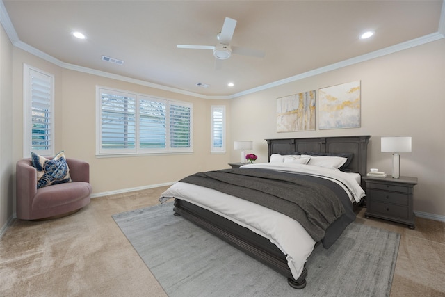 bedroom featuring ornamental molding, light carpet, and ceiling fan