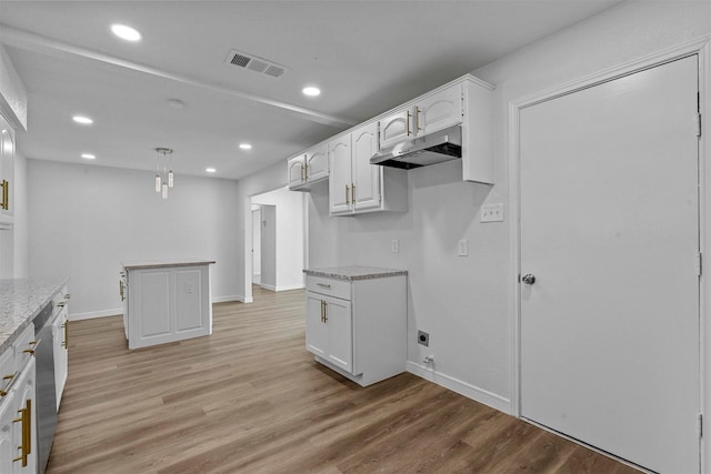 kitchen with dishwasher, pendant lighting, light wood-type flooring, and white cabinetry