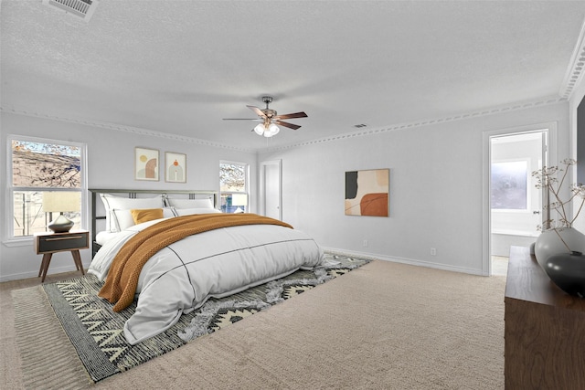 bedroom with visible vents, a ceiling fan, carpet flooring, a textured ceiling, and baseboards