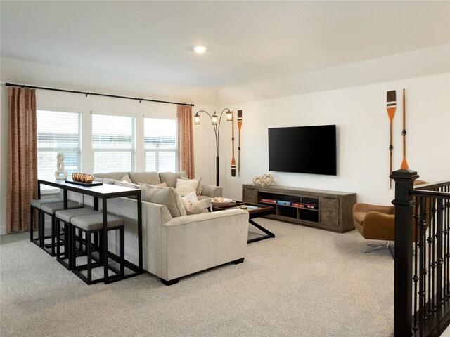 living room with light colored carpet