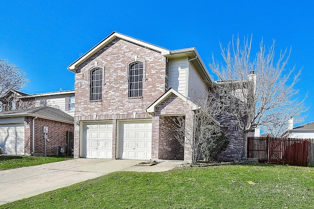 view of front property with a garage and a front yard