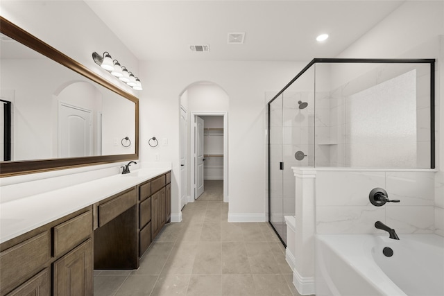 bathroom with visible vents, an enclosed shower, tile patterned flooring, vanity, and a tub to relax in