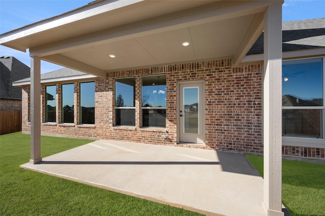 view of patio featuring fence