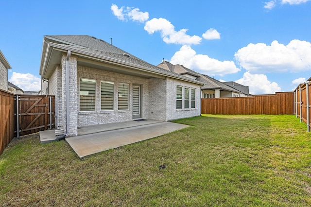 1208 Grass Hollow Pl, Celina, TX 75009 - rear view of property with a fenced backyard, brick siding, a patio, a shingled roof, and a gate