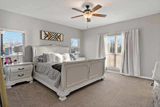 bedroom with multiple windows, carpet flooring, and ceiling fan