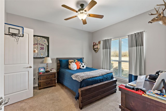 bedroom with light colored carpet and ceiling fan