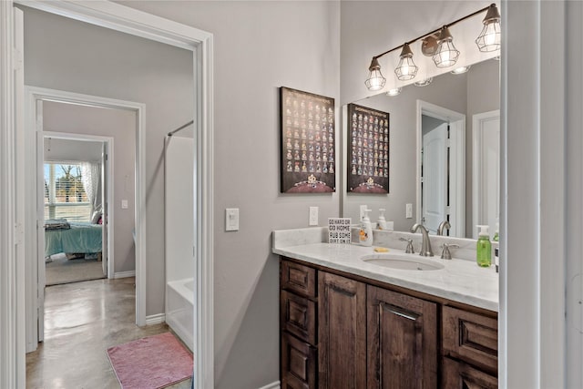 bathroom with vanity and concrete floors