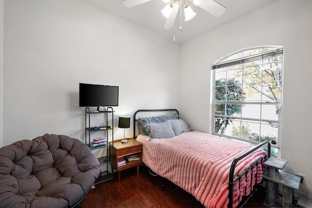 bedroom featuring ceiling fan and dark hardwood / wood-style floors