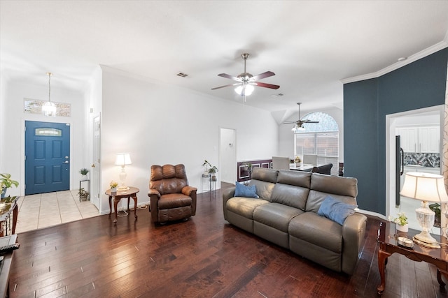 living room featuring crown molding, wood-type flooring, and ceiling fan