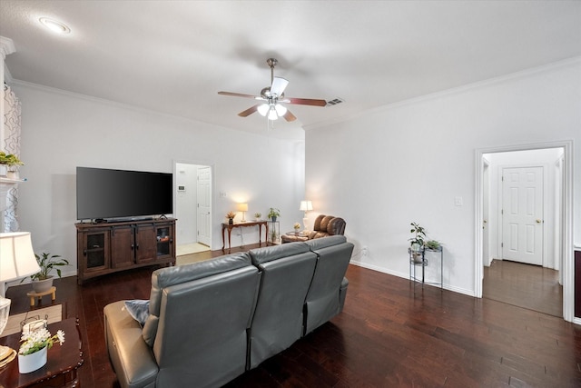 living room featuring ceiling fan, dark wood-type flooring, and ornamental molding