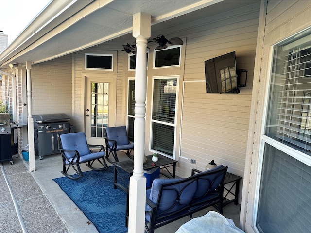 view of patio / terrace featuring ceiling fan and a grill