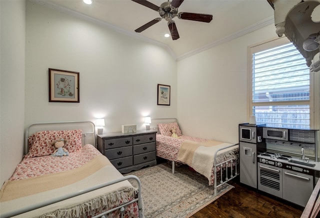 bedroom with ceiling fan, dark hardwood / wood-style flooring, ornamental molding, and vaulted ceiling