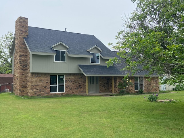 view of front of property with a front lawn