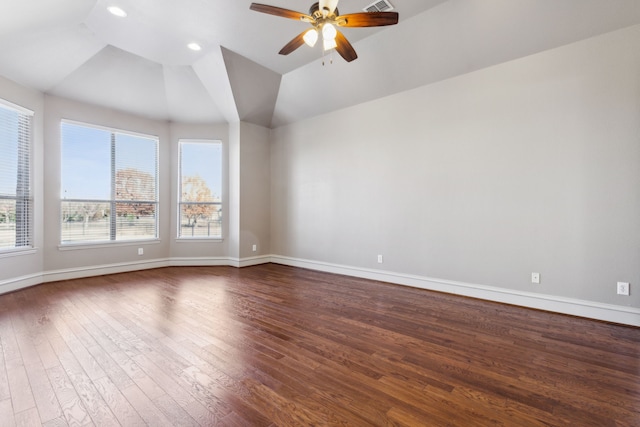 unfurnished room featuring dark hardwood / wood-style floors, ceiling fan, and lofted ceiling