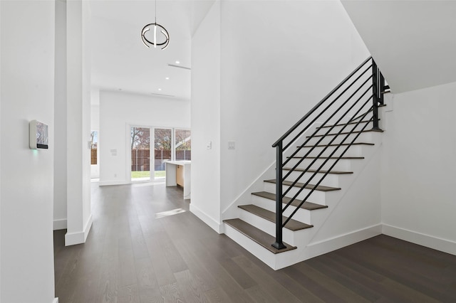 stairway with wood-type flooring