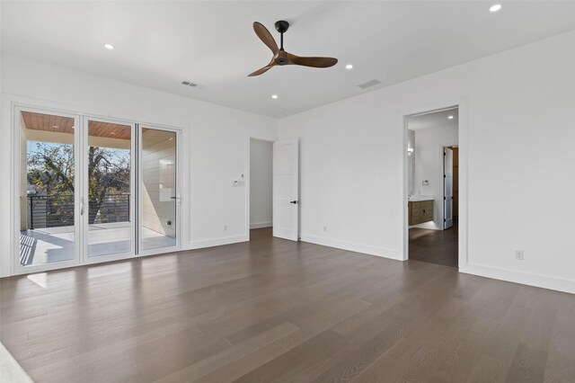 interior space featuring ceiling fan and dark hardwood / wood-style floors