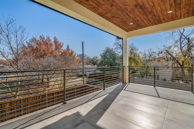 view of patio with a balcony