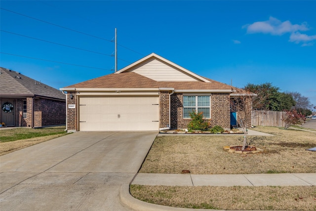 ranch-style house with a front yard and a garage