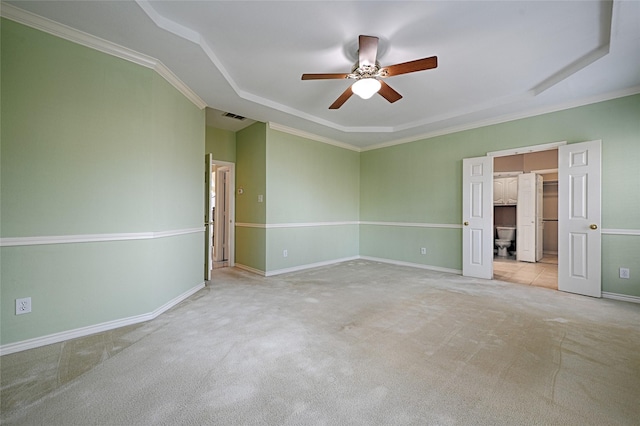 unfurnished bedroom with ceiling fan, light carpet, and ornamental molding