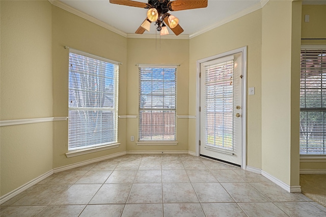 entryway with ceiling fan, light tile patterned flooring, and ornamental molding