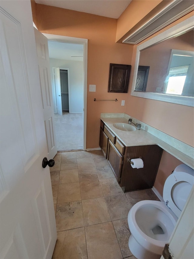 bathroom with tile patterned flooring and vanity