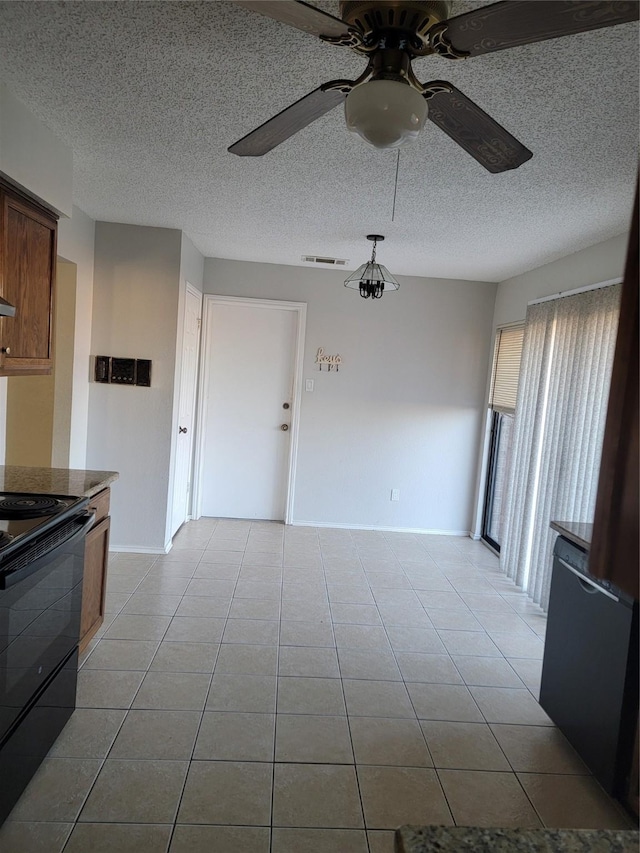 kitchen featuring ceiling fan, black range with electric stovetop, a textured ceiling, and light tile patterned floors