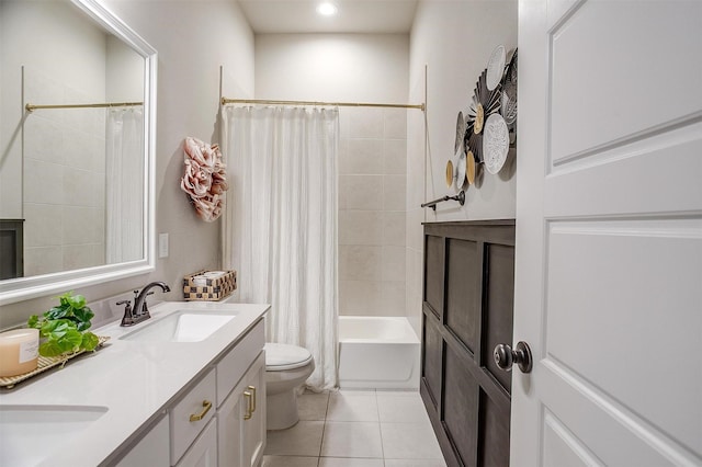 full bathroom with tile patterned flooring, vanity, shower / tub combo with curtain, and toilet