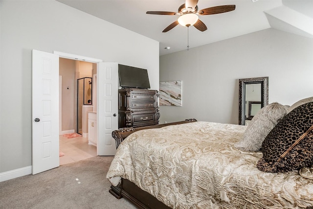 carpeted bedroom featuring ensuite bathroom, ceiling fan, and lofted ceiling