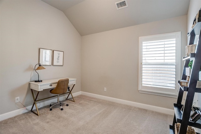 office featuring light carpet and lofted ceiling