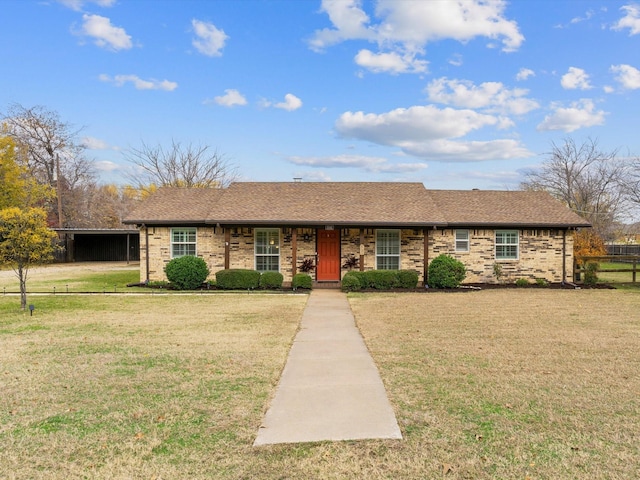 single story home featuring a front lawn