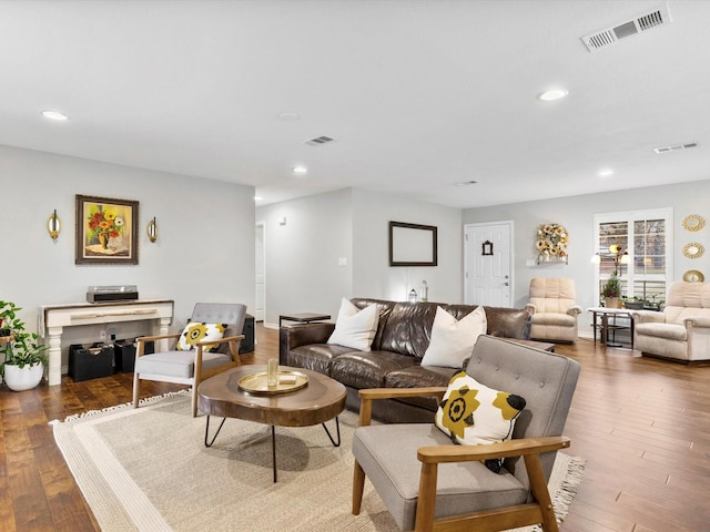 living room featuring dark hardwood / wood-style flooring