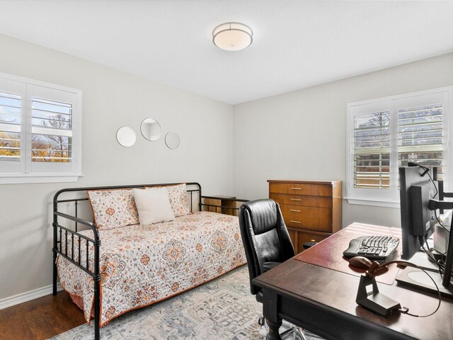 bedroom featuring hardwood / wood-style flooring