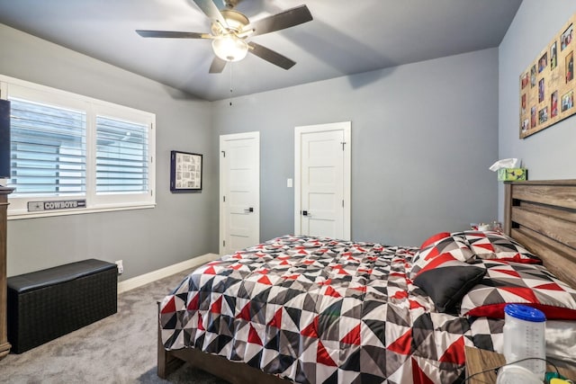 bedroom with carpet floors, ceiling fan, and baseboards