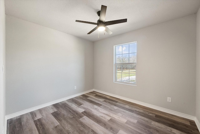 unfurnished room featuring ceiling fan and hardwood / wood-style floors