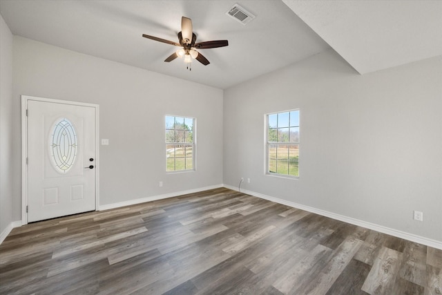 entryway featuring ceiling fan, plenty of natural light, and dark hardwood / wood-style flooring