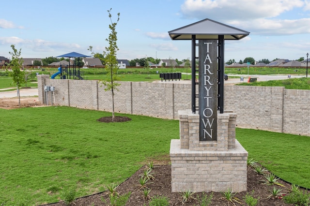 view of playground featuring a lawn