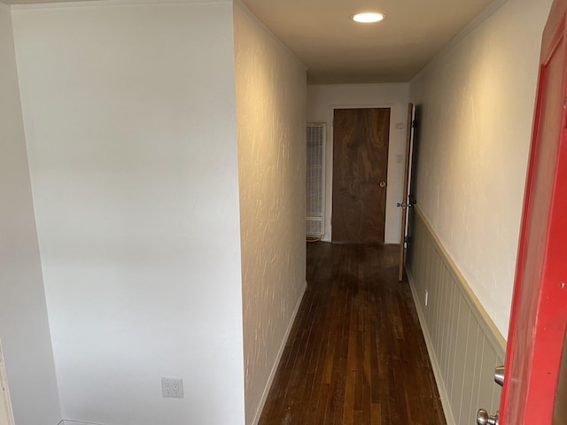 corridor featuring dark hardwood / wood-style flooring