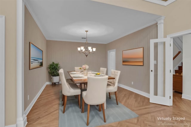 dining area with baseboards, stairs, crown molding, ornate columns, and a chandelier