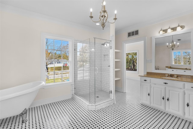 1102 Howell St, Mckinney, TX 75069 - full bathroom featuring a chandelier, vanity, a stall shower, a freestanding tub, and ornamental molding